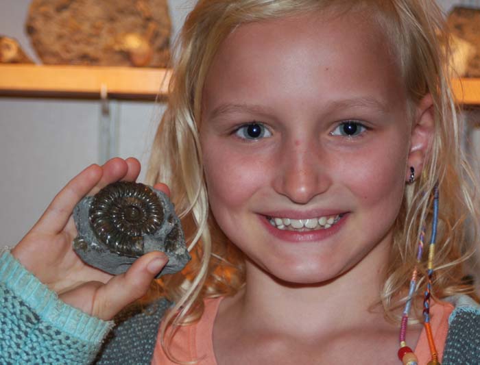 Amelia with her Arnioceras ammonite