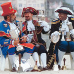 Two Bermudan town criers and the Lyme Regis town crier on the beach at Lyme in 2000 after winning many prizes.